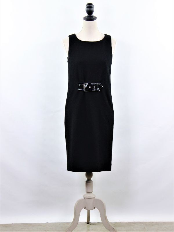Knappe jurk met latex detail gemerkt Moschino Couture!